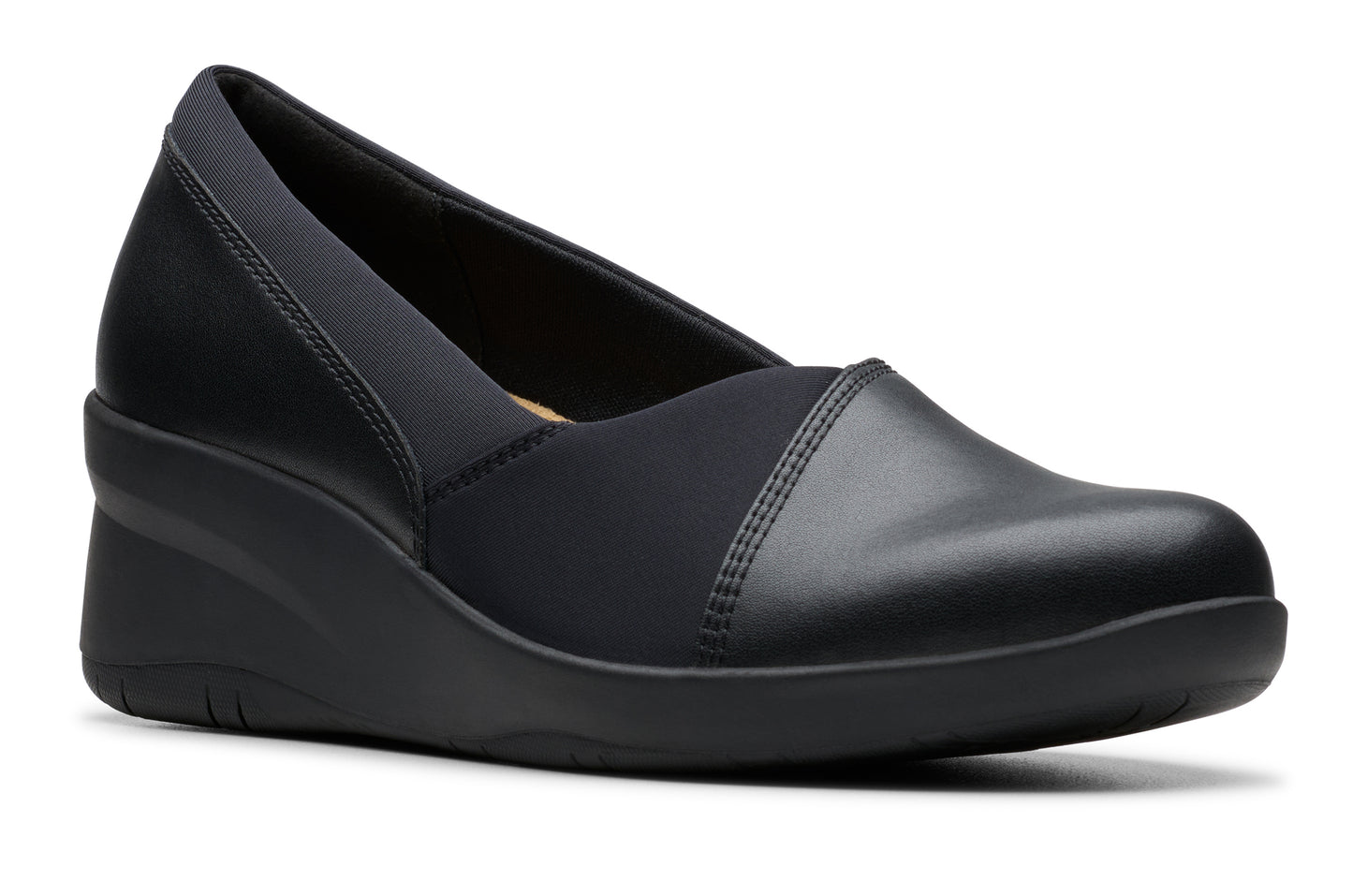 Black slip-on wedge shoe with a rounded toe and elastic band.