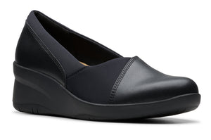 Black slip-on wedge shoe with a rounded toe and elastic band.