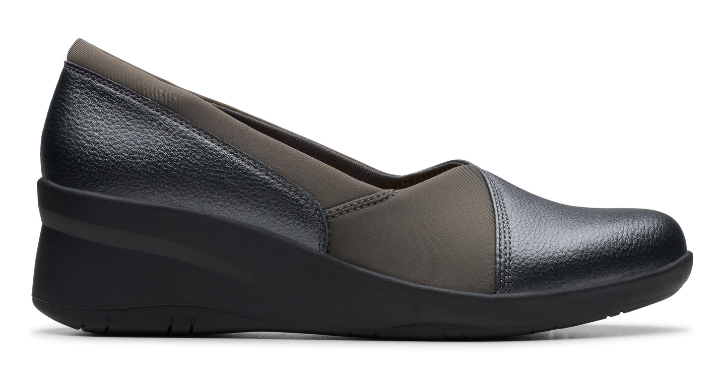 Wedge shoe with a dark gray upper.