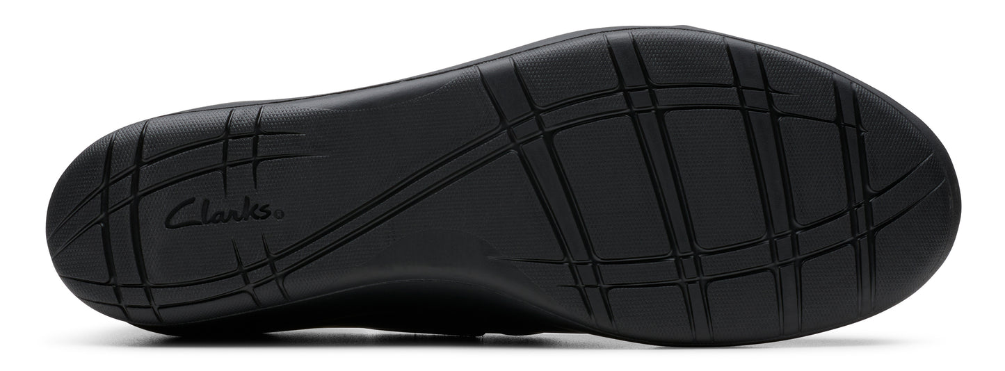 Sole of a shoe with intersecting grooves.