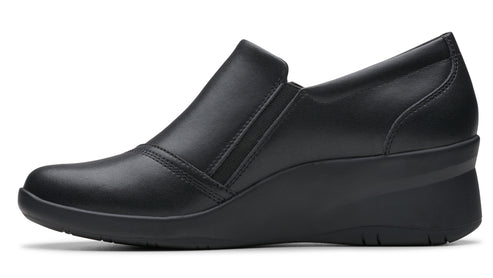 Black wedge shoe with smooth leather upper and elastic side goring.