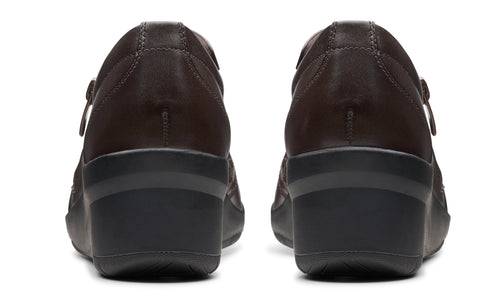 Pair of brown, low heel dress shoes.