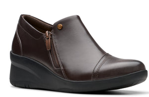 Dark brown women's bootie with a side zipper and wedge heel.