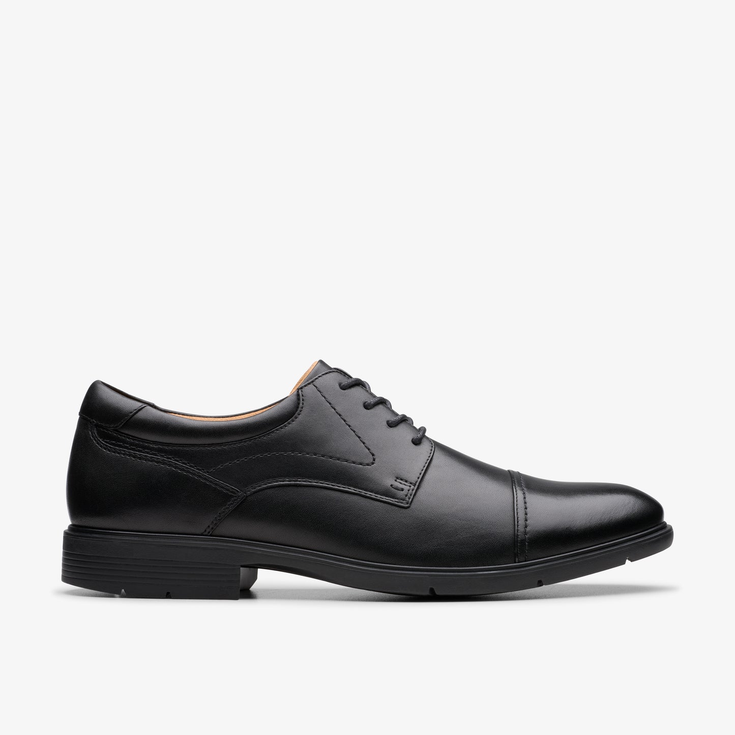 Black leather dress shoe with cap toe and lace-up closure.