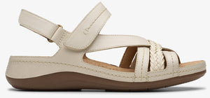 A sandal with braided straps and an adjustable ankle strap.