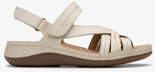A sandal with braided straps and an adjustable ankle strap.