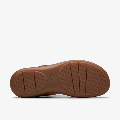 Brown sandal sole with embossed details.