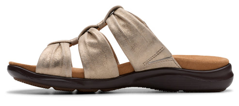 Slip-on sandal with multiple knotted straps.