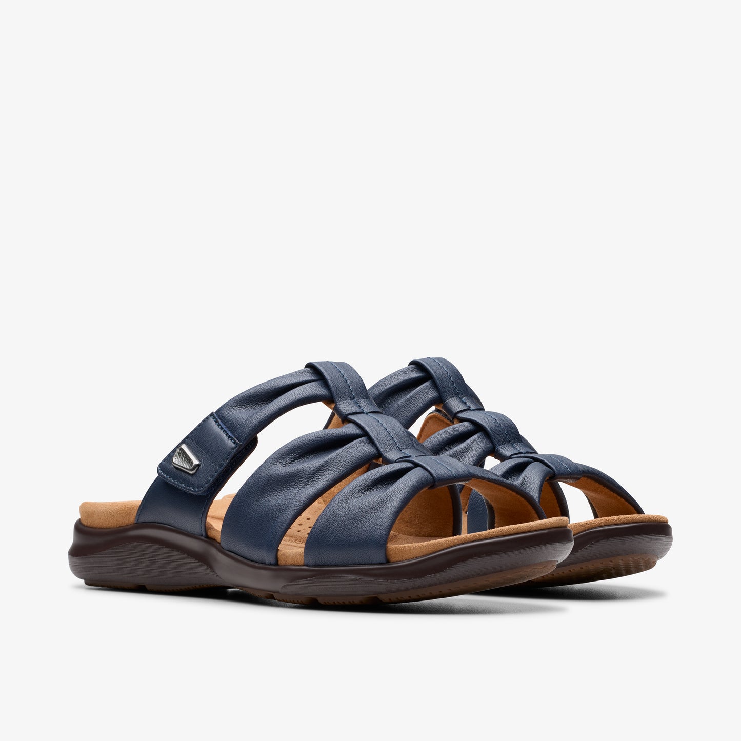 Pair of navy blue leather slide sandals with ruched straps.