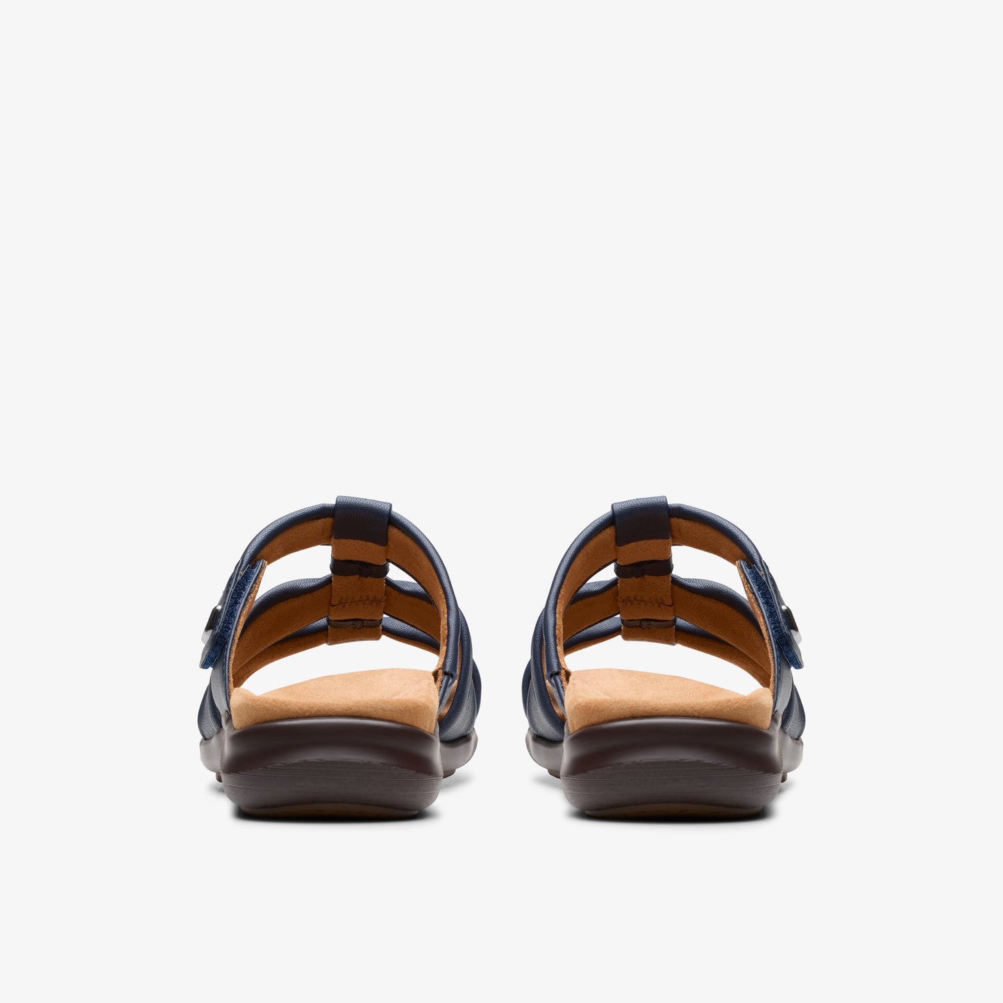 Back view of a pair of blue slide sandals with brown insoles and dark soles.