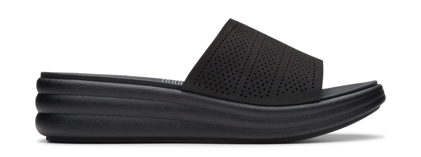 A black, wedge-heeled sandal with a perforated upper.