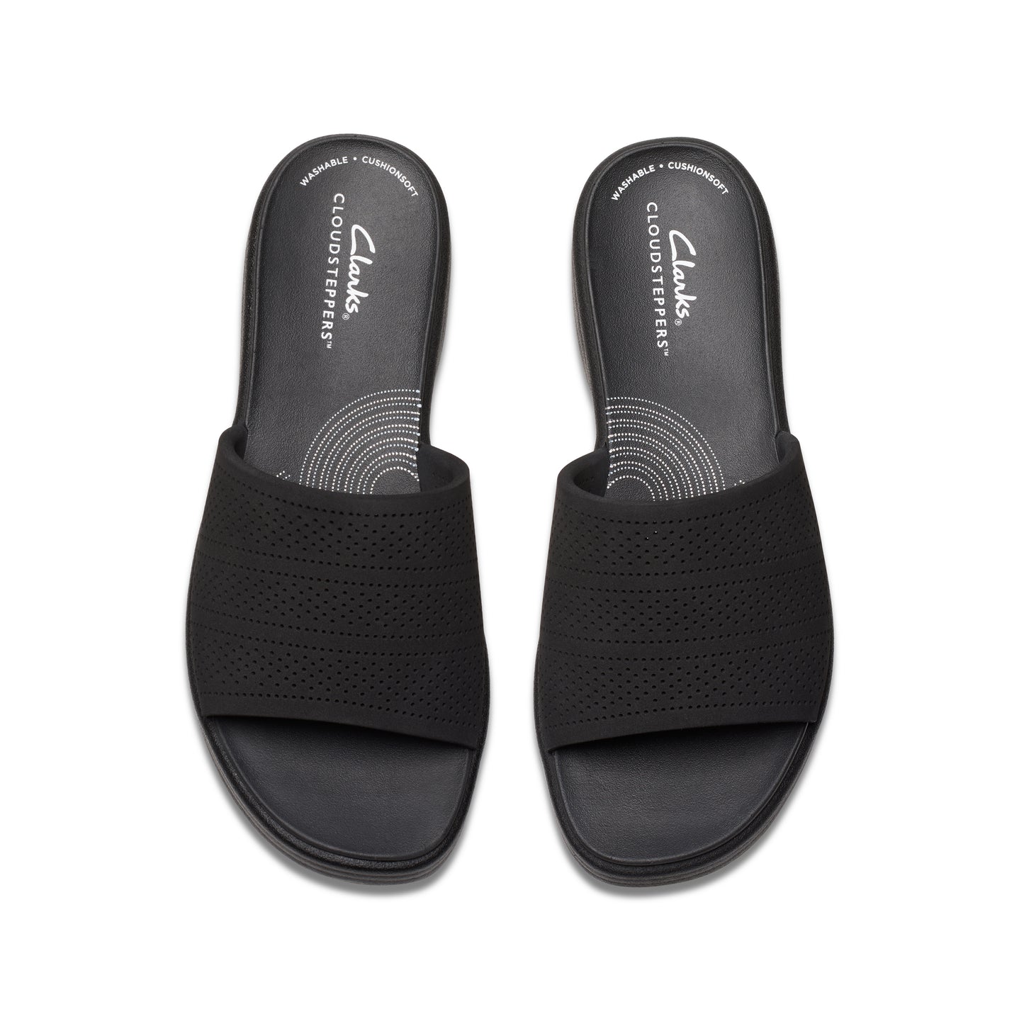 Overhead view of a pair of black slide sandals with a patterned strap.