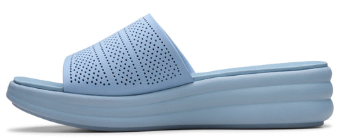 A light blue perforated slide sandal with a wedge heel.