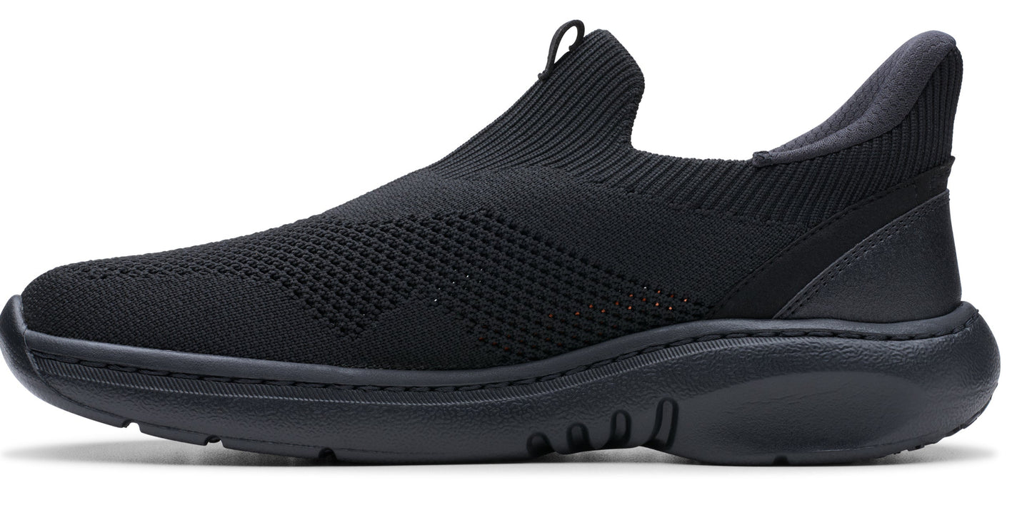 Black slip-on sneaker with sock-like knit upper and chunky sole.