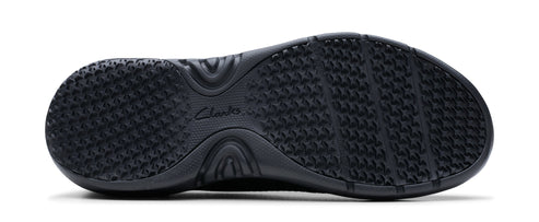 A black shoe sole with a textured grip pattern.