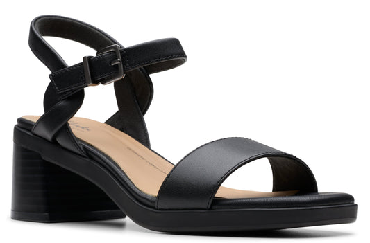 Black heeled sandal with ankle strap.
