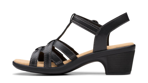 Black sandal with ankle strap and t-strap, crisscross vamp and block heel.