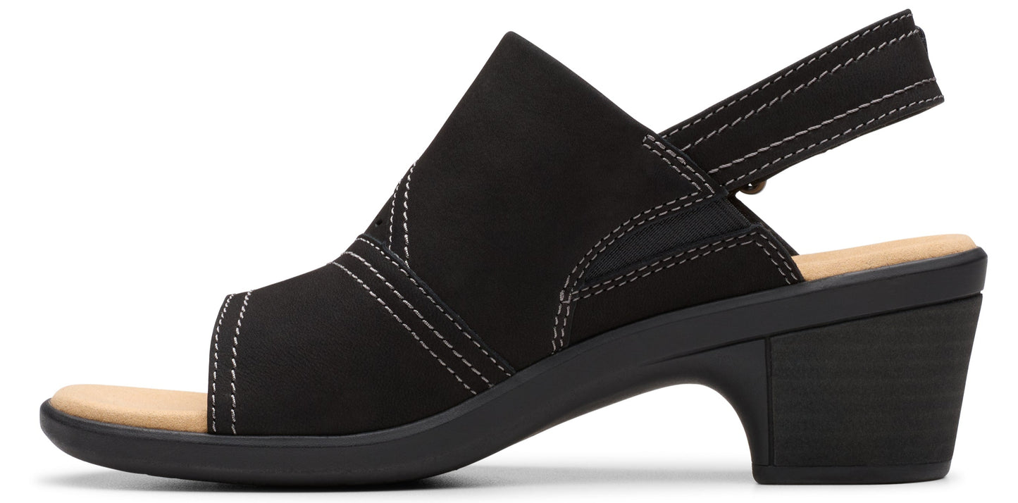 Black slip-on sandal with block heel and slingback strap.