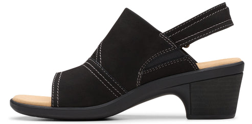 Black slip-on sandal with block heel and slingback strap.