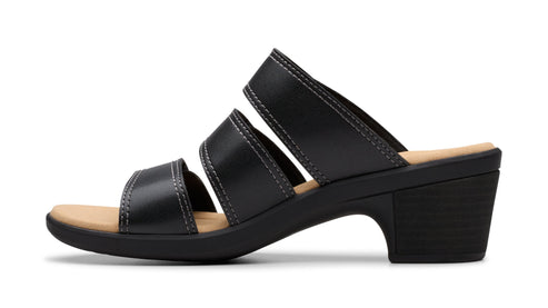 Black sandal with three straps and a block heel.