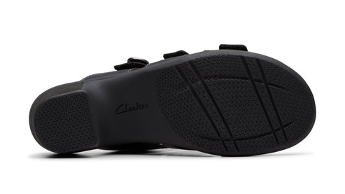 Black sandal sole with textured pattern and visible 'Clarks' logo.