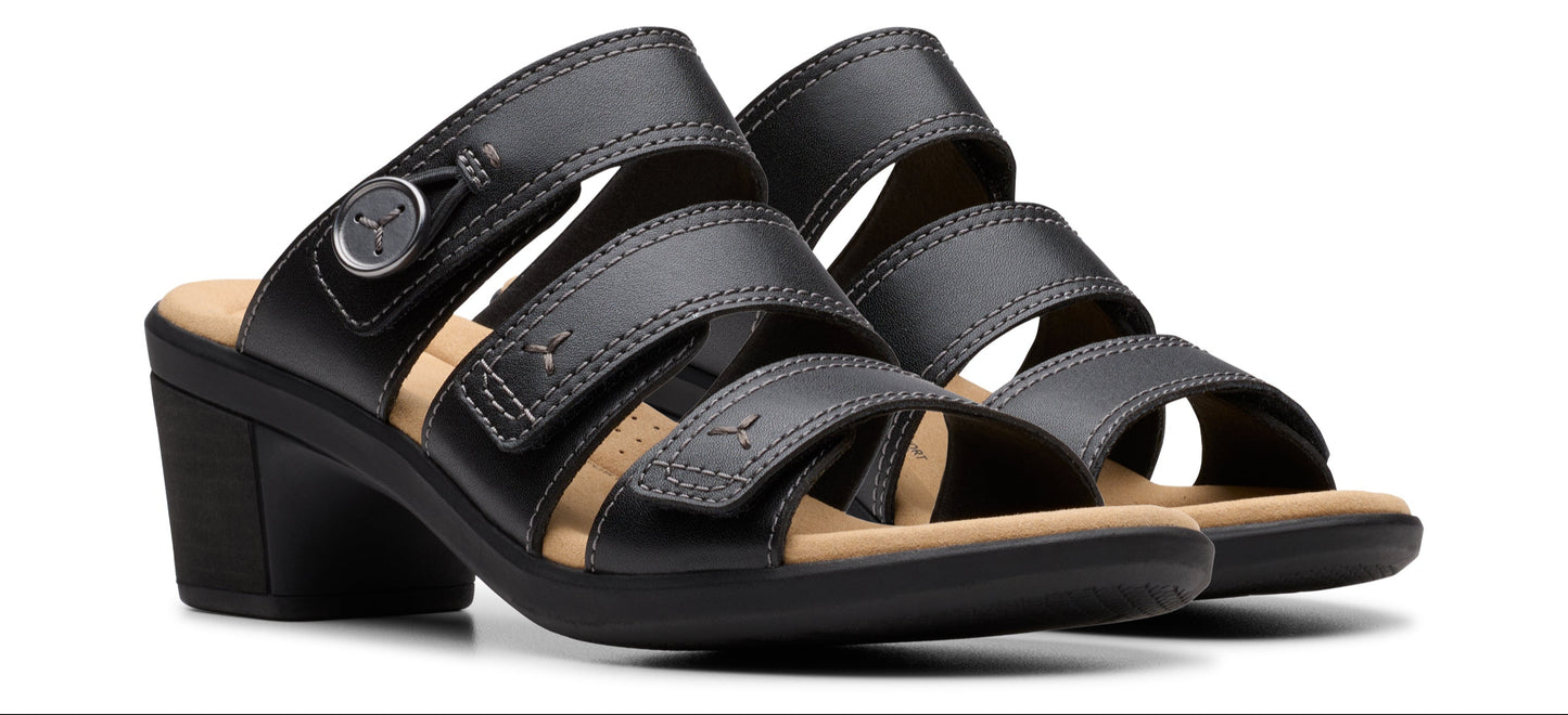 A pair of black leather sandals with three straps.