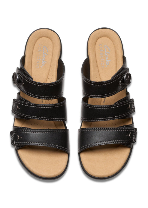 Black leather sandals with three straps and adjustable buckles.