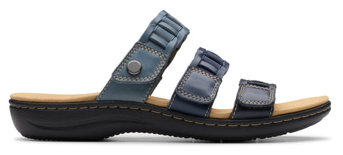 A blue sandal with three straps.