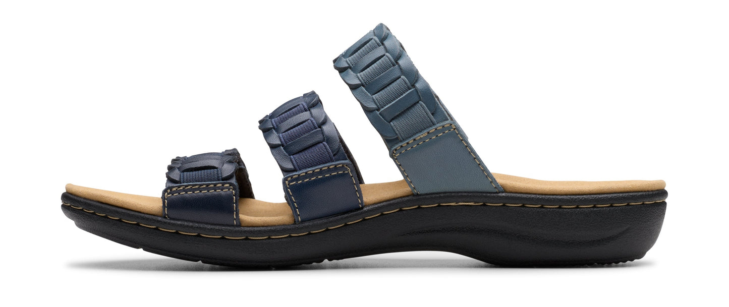 A women's blue sandal with three straps.