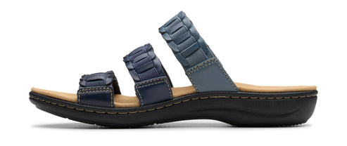 A women's blue sandal with three straps.