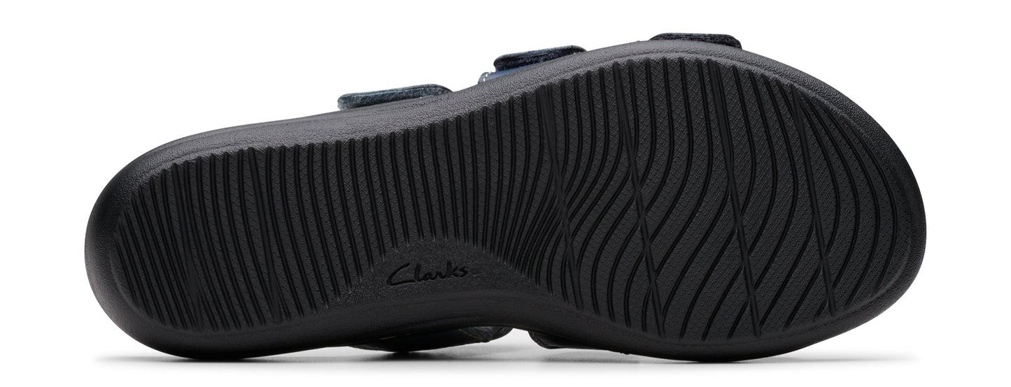 Shoe sole with deep linear treads.