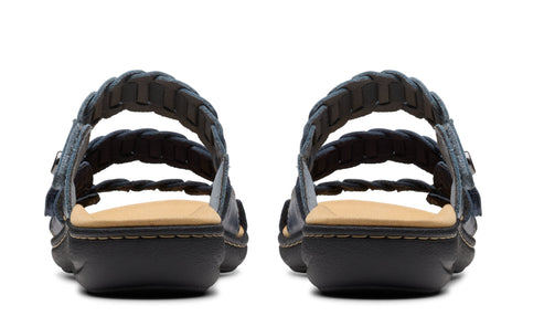 Pair of navy blue leather sandals with braided straps, viewed from the back.