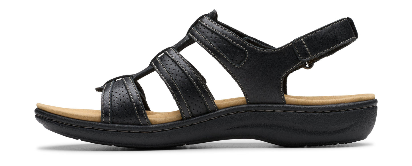 Black sandal with multiple straps and a velcro heel strap.