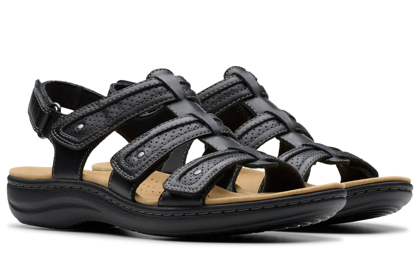 Pair of black strappy sandals with velcro straps, black soles, and tan insoles.