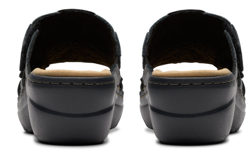 Pair of black clogs with cushioned insoles and adjustable velcro straps, back view.
