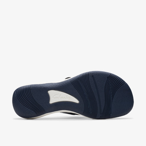 Bottom view of sandal with dark-blue and white sole.
