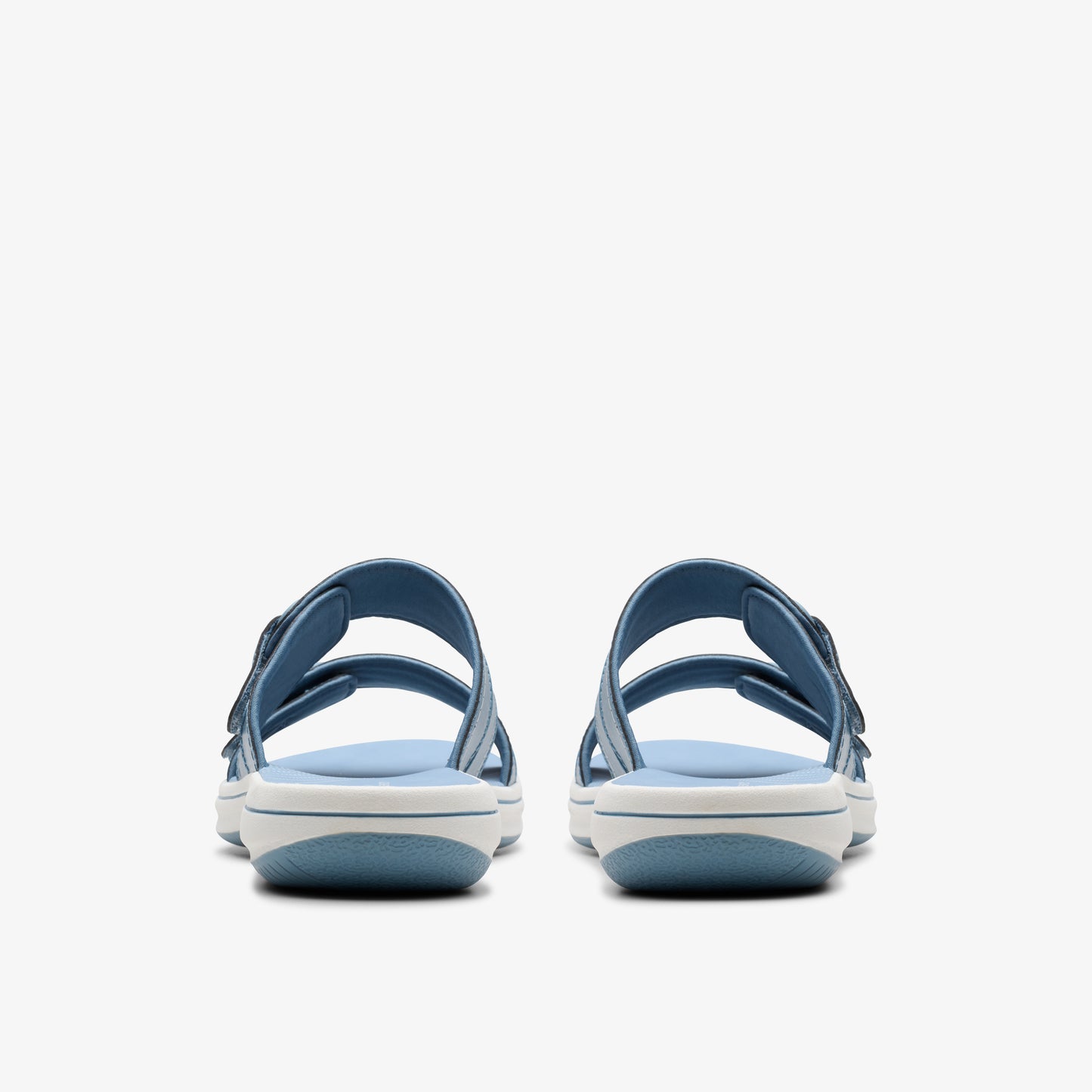 Two blue sandals with two straps and adjustable buckles, viewed from the back.