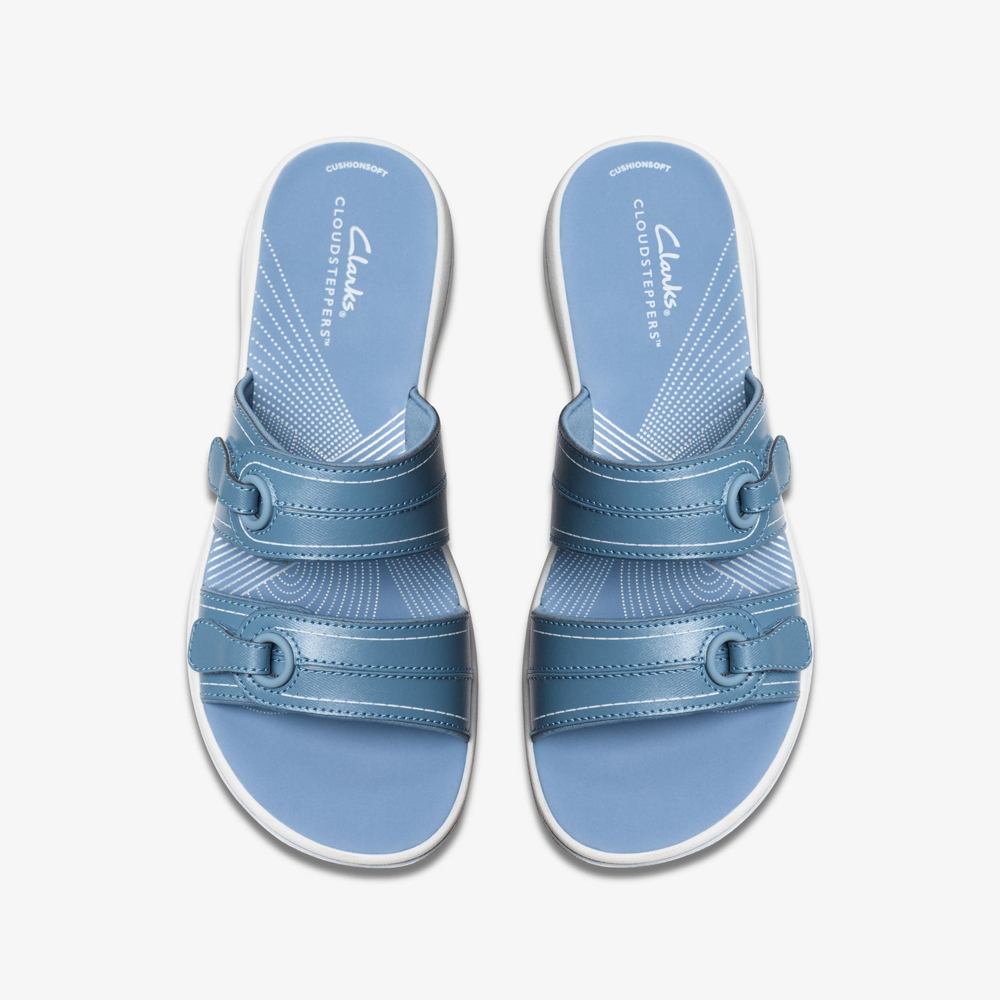 Two blue slide sandals with white soles and two adjustable straps each, bearing the text CLOUDSSTEPPERS.