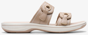 Two-strap sandal with buckle embellishments.