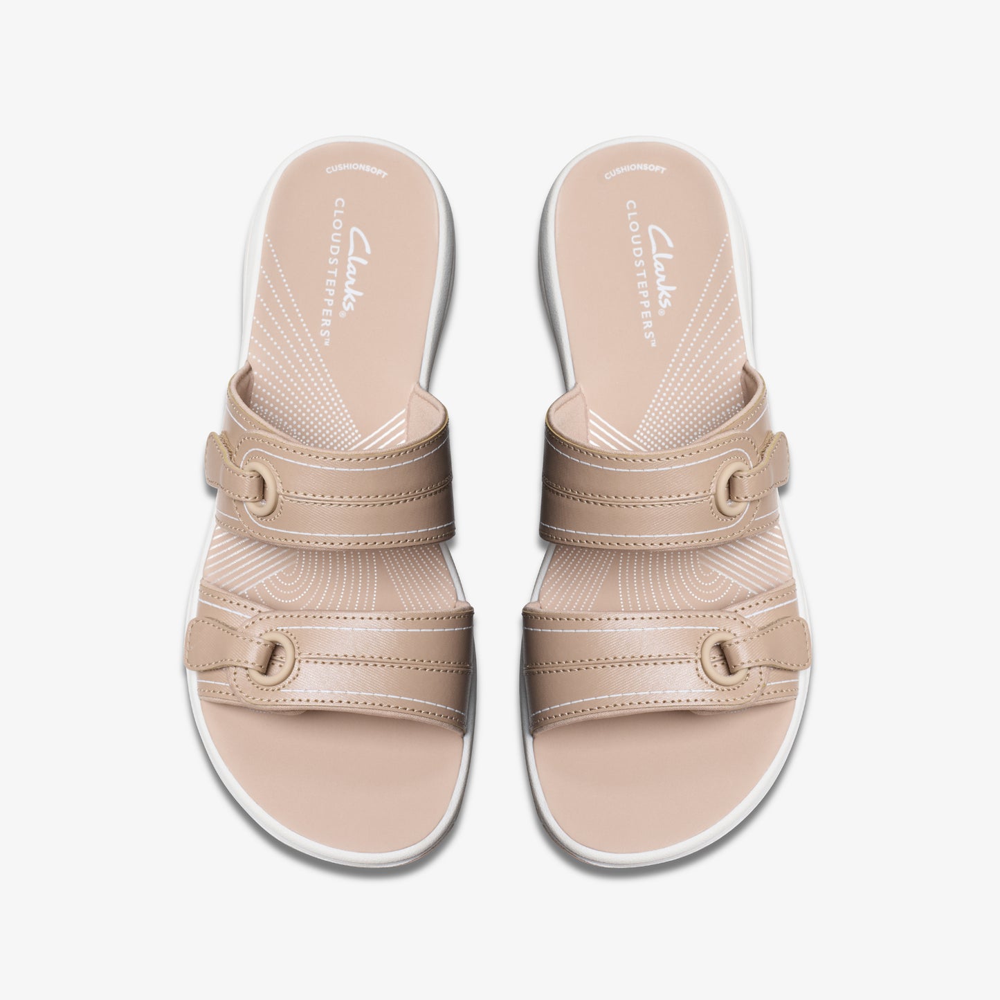 Pair of beige adjustable sandals with two straps.