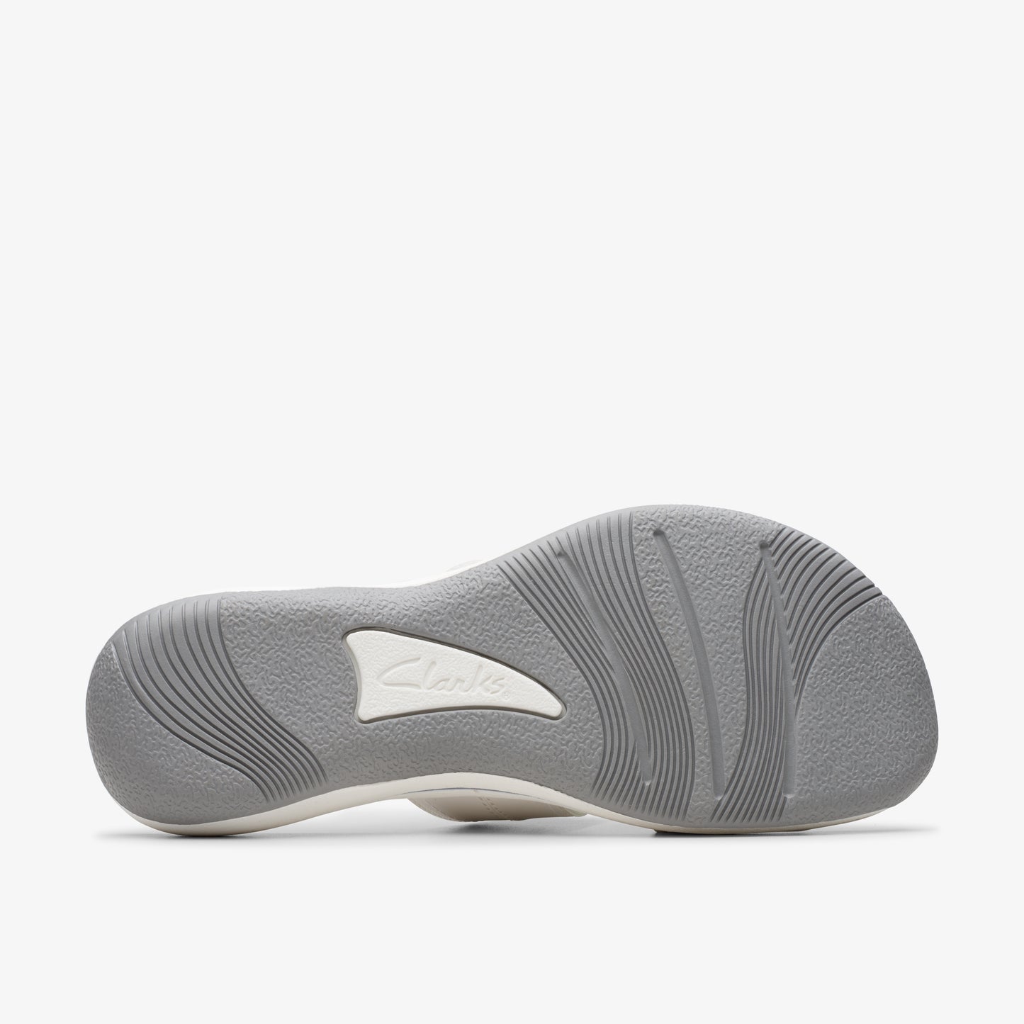 Sandals with grey sole and white logo.