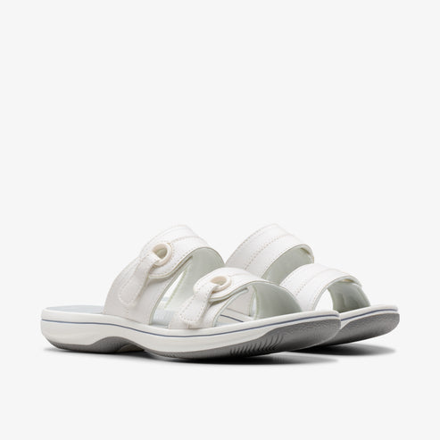 White adjustable two-strap sandal.