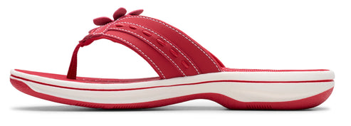 Red flip-flop sandal with flower accents.