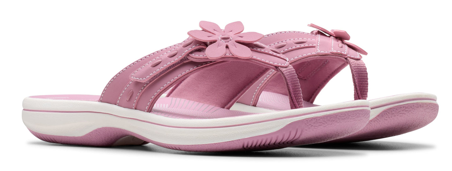 Pink flower-decorated sandal.