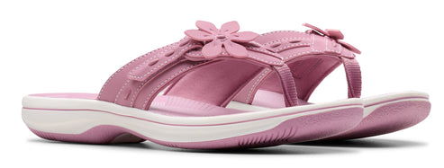 Pink flower-decorated sandal.