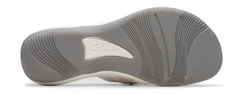 The sole of a shoe with a repeating curved line pattern and the text 'Clarks'.