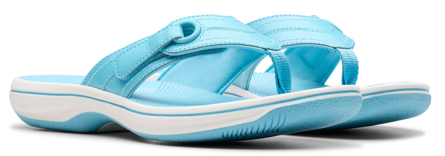 A pair of light blue thong sandals with white soles.