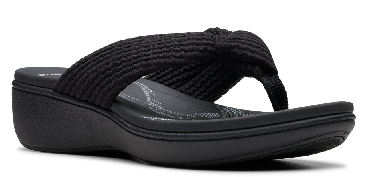 A black sandal with a wedge heel and a knitted upper.