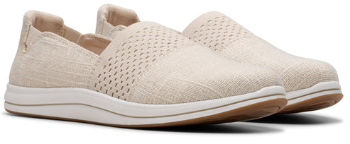 A pair of beige slip-on shoes with a white sole.