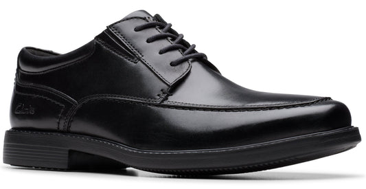 Black leather dress shoe with lace-up closure and synthetic sole.